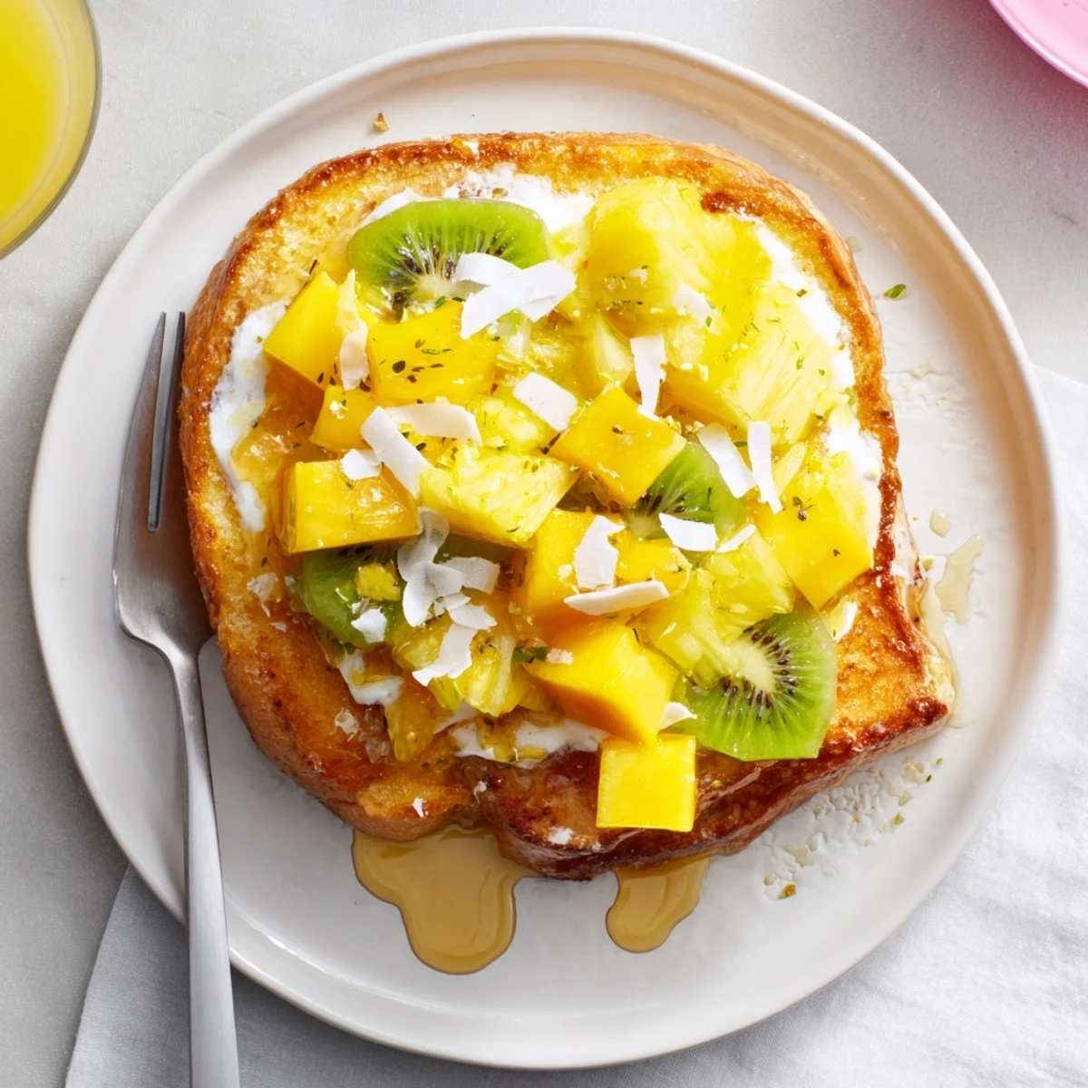 Deliciously rich yogurt-custard toast, perfectly enhanced with fresh fruit toppings.