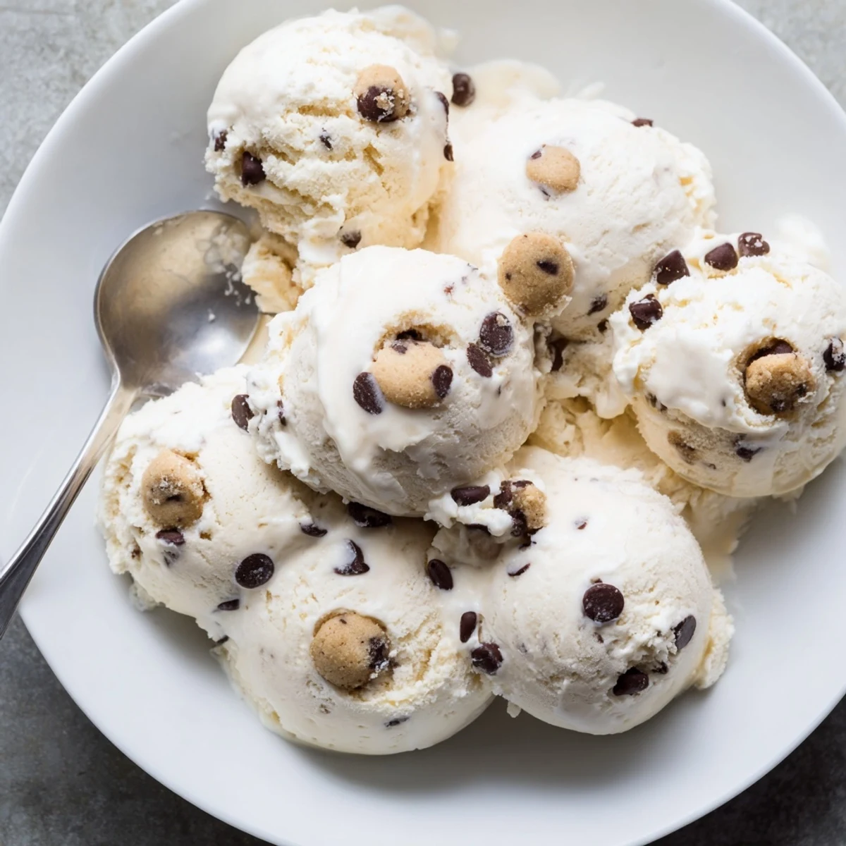 Creamy cottage cheese ice cream with cookie dough makes a delicious summer treat.  