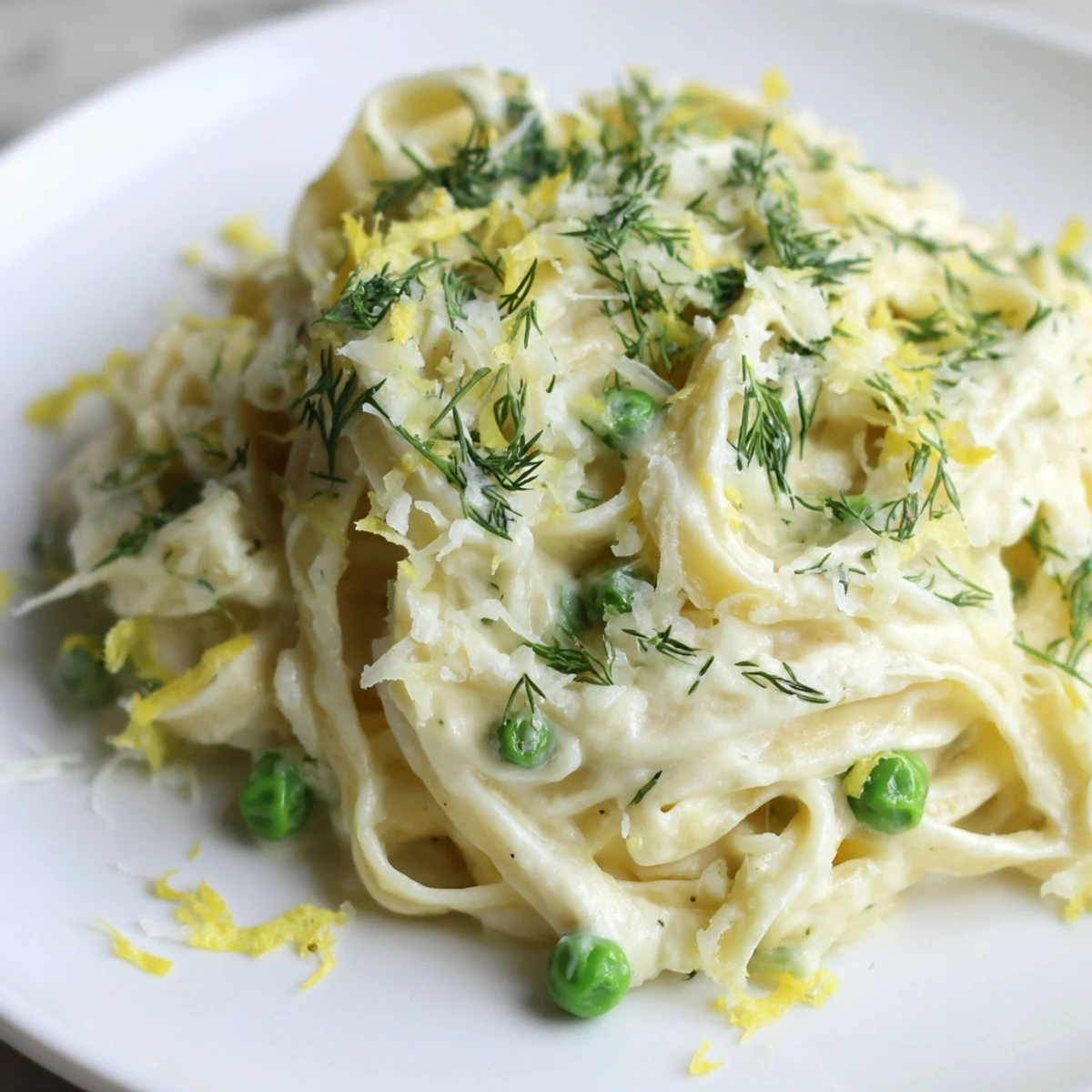Creamy Dill Pasta with a rich, velvety sauce, fresh dill garnish, and penne pasta noodles.