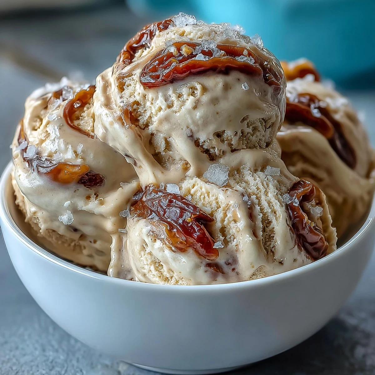 Nutty tahini base blended with rich cream, ribboned with sweet dates and garnished with sea salt for a Middle Eastern-inspired dessert.  