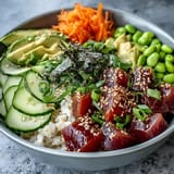 Colorful Spring Tuna Poke Bowl, a light, refreshing meal with crisp textures.