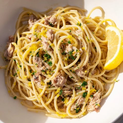 Close-up of Lemon-Garlic Tuna Spaghetti: a flavorful pasta dish with flaky tuna and bright lemon.