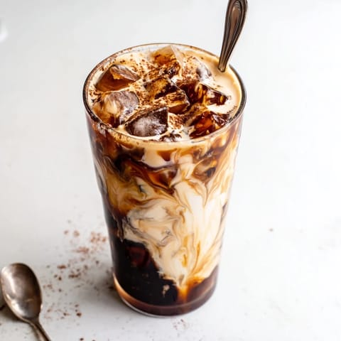 Refreshing tahini iced coffee drink blending rich flavors and smooth texture perfect for summer.  