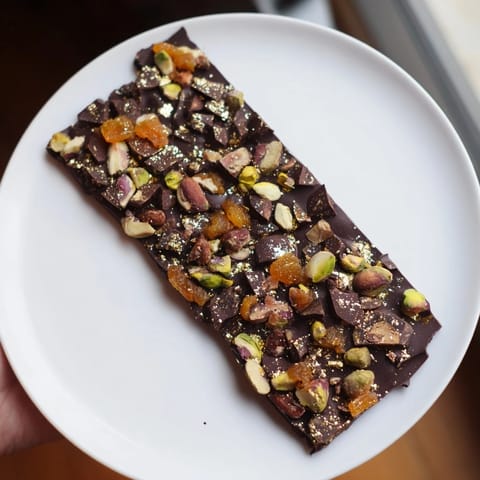 Dark chocolate studded with pistachios and apricots transforms into delicious Dubai Chocolate Bark.