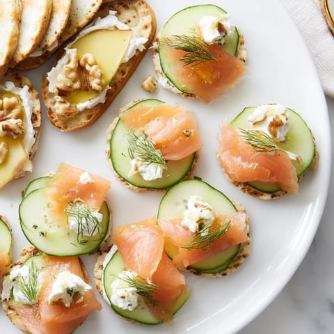 Elegant champagne pairings are ready to be served, showcasing savory bites such as prosciutto and goat cheese.