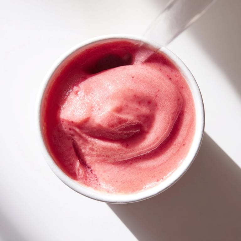 Homemade fruit smoothie recipe, bursting with fresh fruit for a healthy breakfast treat.