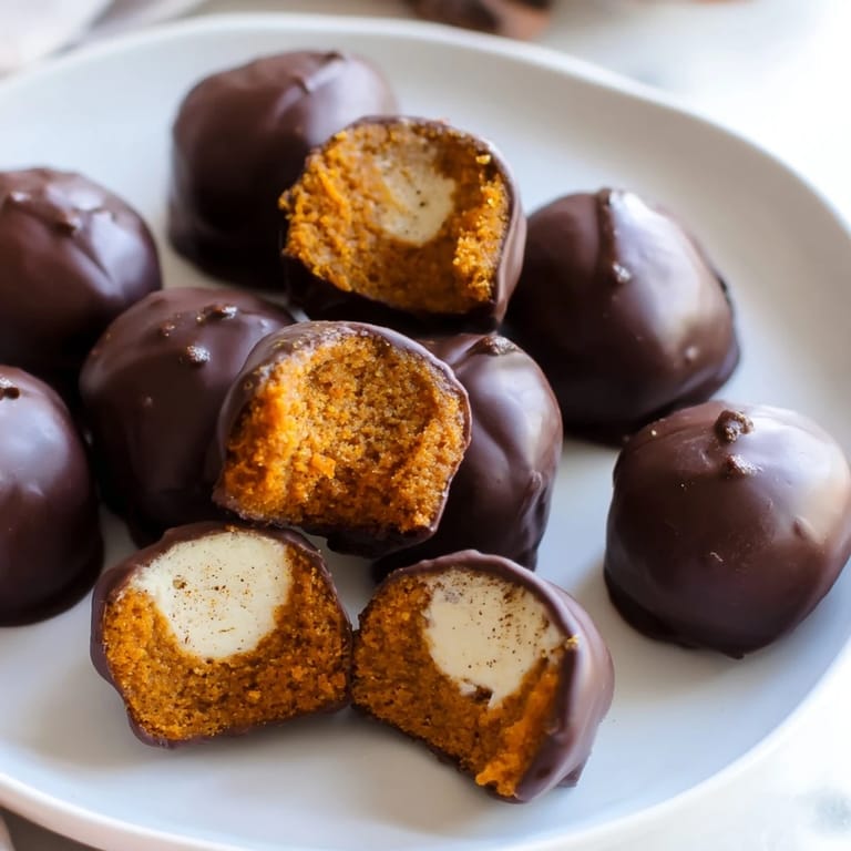 Deliciously spiced Gingerbread Pumpkin Muffin Ice Cream Bites, a unique dessert treat idea.  