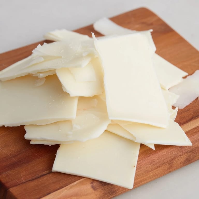 Artistic presentation of The Arctic Tundra dessert showcasing contrasting textures with sea salt flakes sprinkled on top.