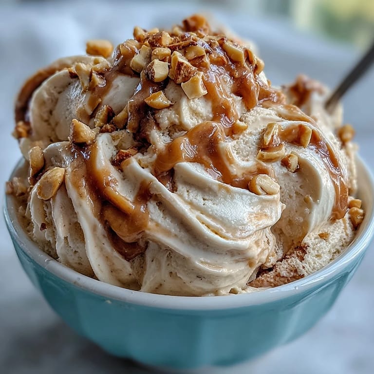 Smooth peanut butter banana ice cream with a soft-serve consistency, ideal for quick vegan treats.